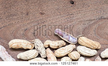 A pile of Boiled Peanuts on wooden table background.