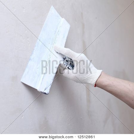 iş bir spatula duvar ile hizalar