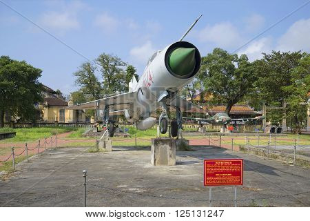 HUE, VIETNAM - JANUARY 07, 2016: Soviet MiG-21 close up. Historical landmark of the city Hue