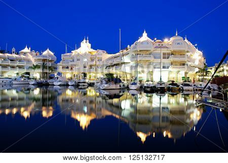 BENALMADENA, SPAIN - JUNE 29, 2008 - Boats and apartments in the marina at dusk Benalmadena Malaga Province Andalusia Spain Western Europe,June 29, 2008.