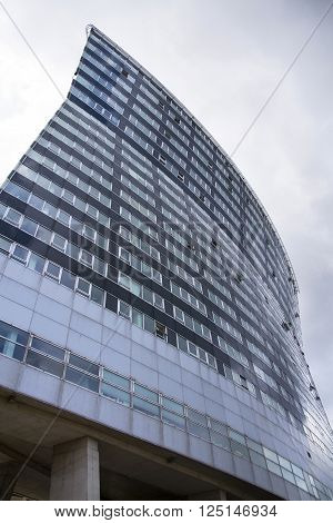 VIENNA, AUSTRIA - MAY 7: Modern buildings in front of Gasometers of Vienna in Austria on 7 May 2012 in Vienna, Austria.