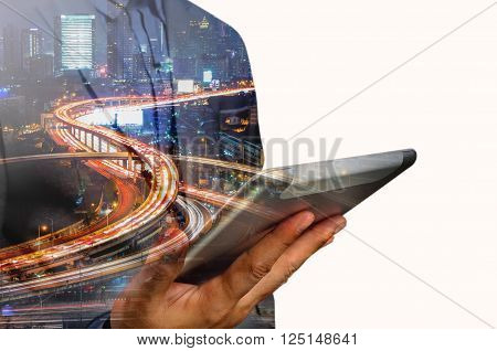 Double Exposure Of Business Man Use Mobile Tablet With Urban City Scenic