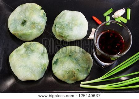 Allium tuberosum. Garlic chives with soy source. Dim sum is chinese cuisine. Dimsum. Flat Lay in Food.