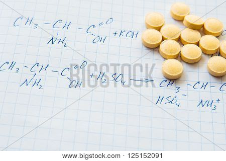 Chemistry science formulas on squared sheet of paper