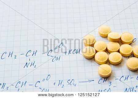 Chemistry science formulas on squared sheet of paper