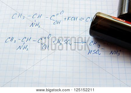 Chemistry science formulas on squared sheet of paper