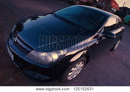 2016-03-29 - Dubicky Czech republic - dark car parked in the evening in village Dubicky near Mlynaruv kamen view and Doerellova vyhlidka view before the start of the tourist season