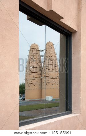 Reflections of old traditional birds house in Doha Qatar