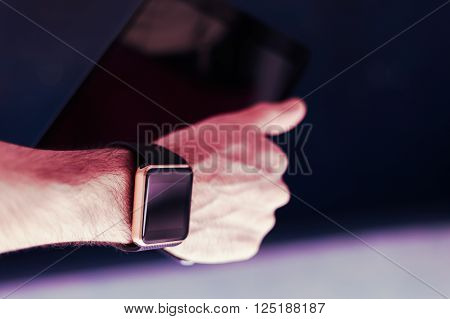 Smart Watch And Tablet Pc In A Hand