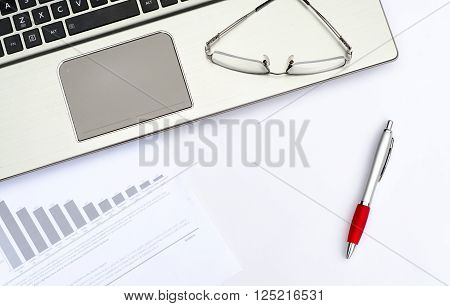 Top view of working place elements on white table