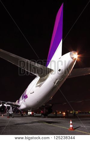 Kiev Ukraine - March 27 2011: Wizz Air Airbus A320 passenger plane at the airport at night - rear view
