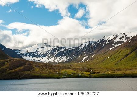 Mighty fjords with mountains covered by snow near Olafsfjordur, Northern Iceland