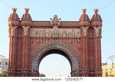 Barcelona, Spain - November 11, 2015: Triumphal arch Arc de Triomf. The arch was built as the main access gate for the 1888 Barcelona World Fair by architect Josep Vilaseca i Casanovas.
