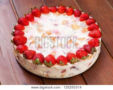 Cake with strawberries gelly yogurt and cherries.
** Note: Shallow depth of field