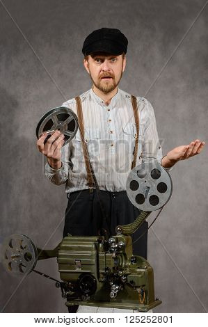 Cameraman with with a old film projection