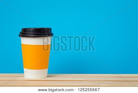 Paper cup with Sleeve on blue background
