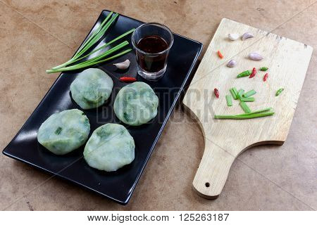 Allium tuberosum. Garlic chives with soy source. Dim sum is chinese cuisine.