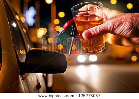 hard drinker with liqueur glass by night