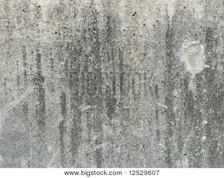 texture béton avec une empreinte circulaire sur le droit