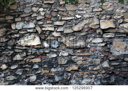 Closeup of the ancient stone wall texture
