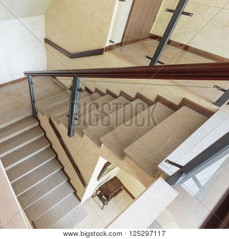 Horizontal view of staircase with tiled stairs