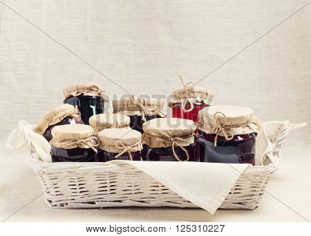 Home cooking jams. Jam and confiture of fruits and berries. Selective focus.
