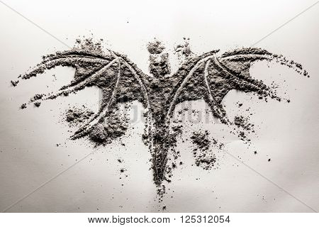 Bat or vampire spooky illustration made in grey ash
