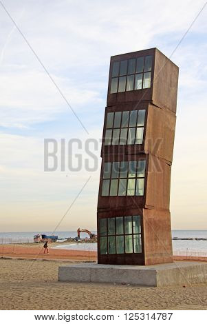Barcelona, Catalonia, Spain - December 13, 2011: El Lucero Herido -  Metallic Cubic Sculpture By Art