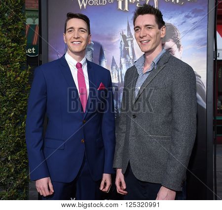 LOS ANGELES - APR 05:  Oliver Phelps & James Phelps arrives to the Wizarding World of Harry Potter Opening  on April 05, 2016 in Hollywood, CA.                