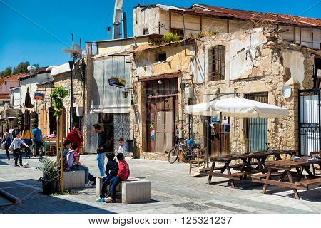 LIMASSOL CYPRUS - April 01 2016: People at the square near The Great Mosque (Cami Kebir).