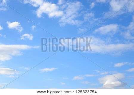 Blue sky with spindrift clouds may be used as background.