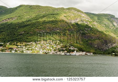 Typical rustic Norwegian village and fjord landscape