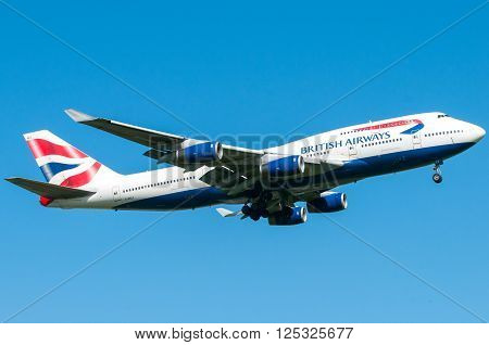 London UK April 9 2011: 4-engines Boeing 747 of British Airways carrier landing at Heathrow airport.