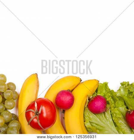 Group of juicy fruits and vegetables on a white background