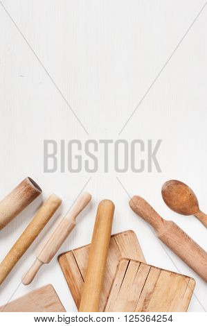 Kitchen utensils on the white wooden table