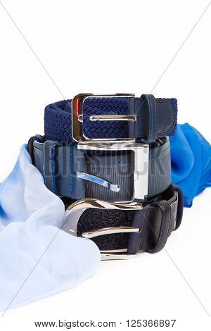 Rolled men's leather belt with metal buckle isolated on white