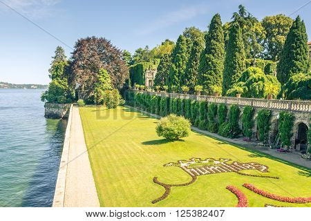 Pictured Isolabella island with its beautiful gardens and its wonderful baroque statues Lake Maggiore Stresa Italy.