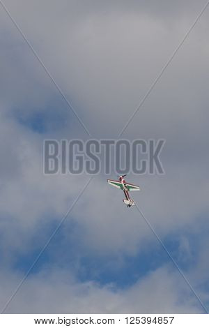 Minsk Belarus-June 21 2014: SU-26M Acrobatics Stunt Plane Performing Elements in Air During Aviation Sport Event Dedicated to the 80th Anniversary of DOSAAF Foundation in Minsk on June 21 2014 in Minsk Republic of Belarus