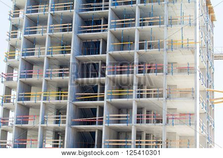 Monolithic frame construction of the building. Solid walls of concrete. Formwork for walls made of concrete. Construction of the building. Masonry walls and aerated concrete masonry walls