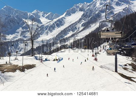 ROSA KHUTOR, RUSSIA - MARCH 31, 2016: View of slopes of Rosa Khutor ski resort