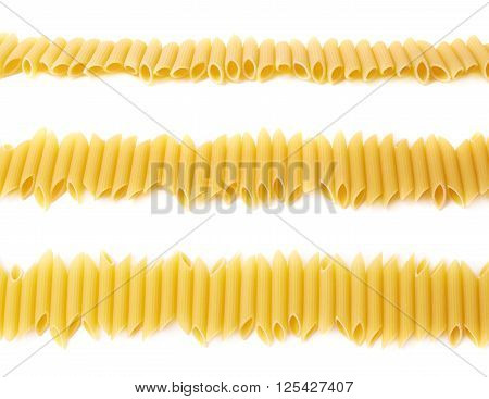 Multiple dried yellow penne pasta noodles lined up in a row, composition isolated over the white background, set of three different foreshortenings