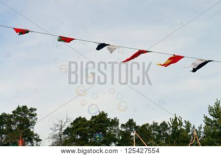 rainbow bubble in the sky with medieval pennants
