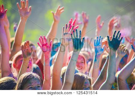 Vitebsk, Belarus - July 4, 2015: Throwing color at the Holi color festival