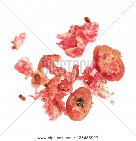 Eaten pomegranate remains and lumps isolated over the white background