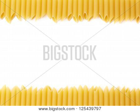 Dried penne pasta copyspace and empty for your text background composition over the white surface