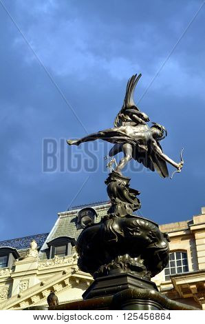 Statue of Eros at Picadilly Circus, London, blue sky