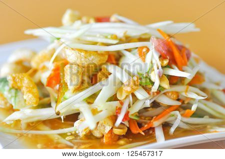 spicy salad or Thai salad with crispy pork