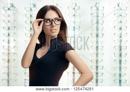Young Woman with Eyeglasses in Optical Store