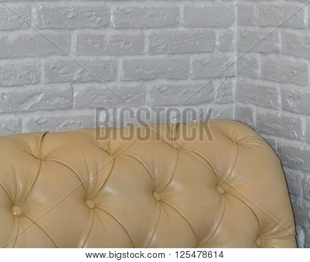 White background brick wall corner texture, sofa