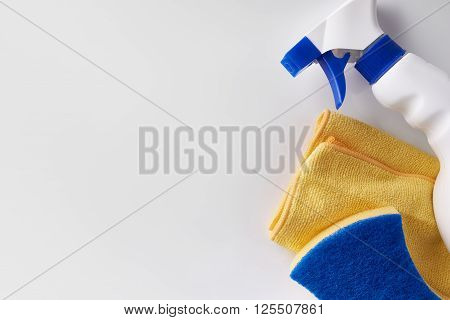Professional Cleaning Equipment On White Table Top View Close Up